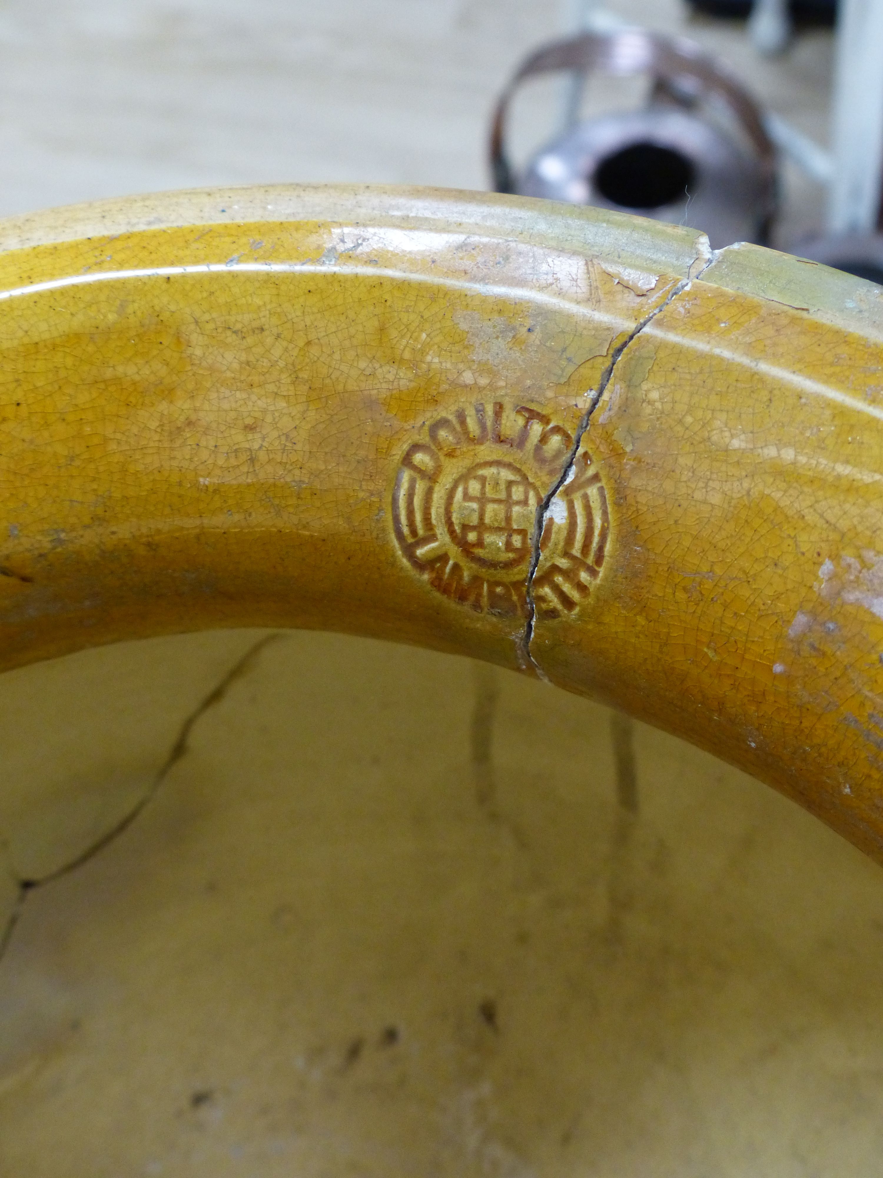 A Doulton Lambeth jardiniere on stand, overall height 92cm (a.f.), the stand apparently unmarked